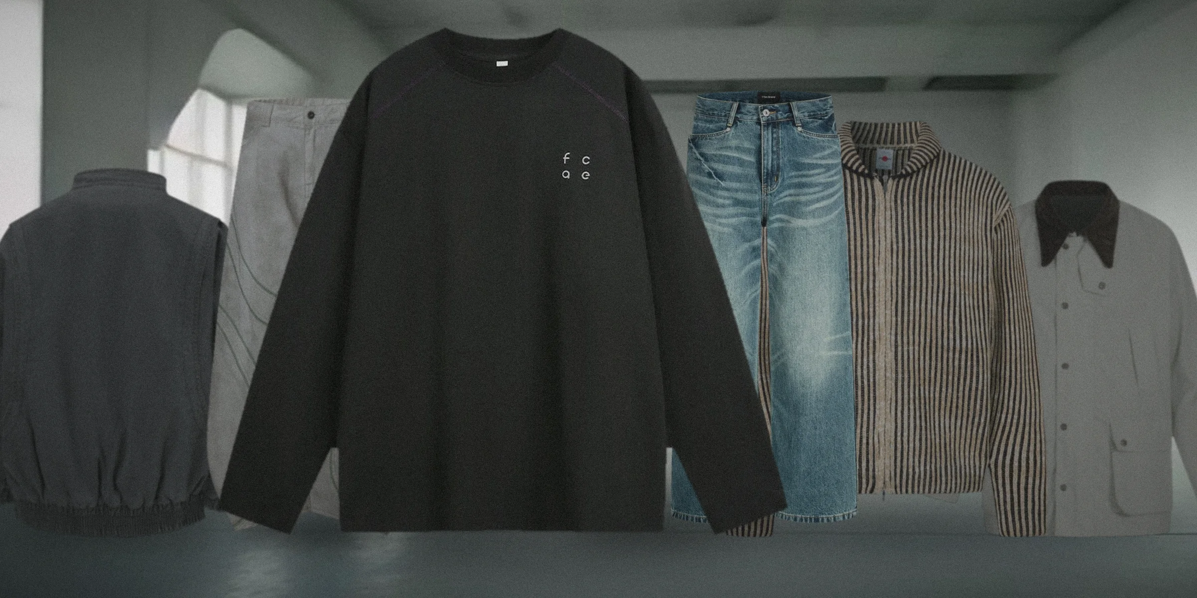 MilkMan garment rail in a grey cyclorama studio